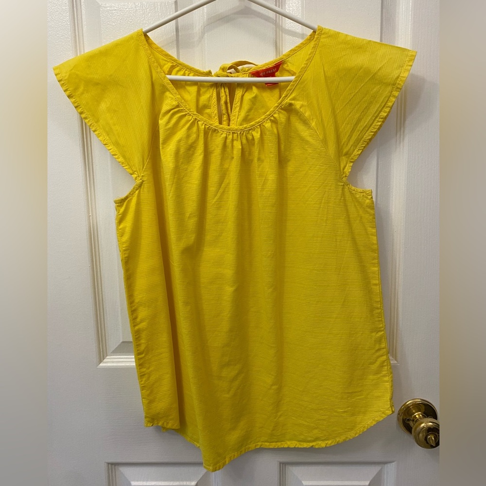 Bright yellow flutter sleeve top